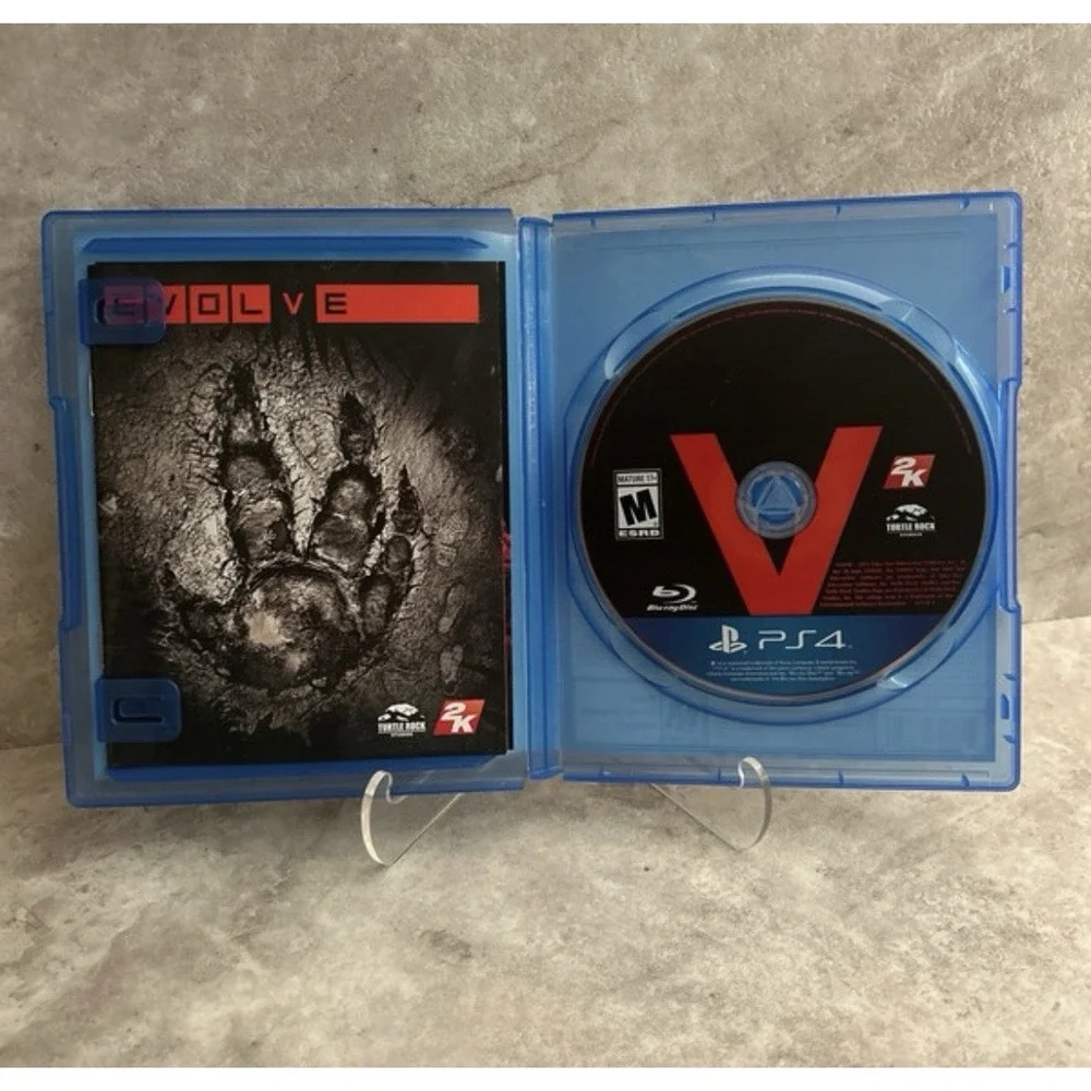 Evolve PS4 Video Game Sony PlayStation 4 + Manual and Slipcover Works!